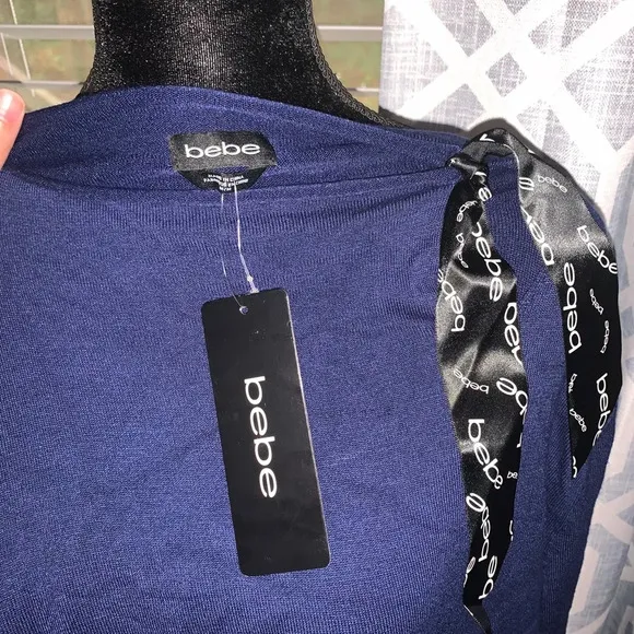 BEBE women’s blue sweater size Medium