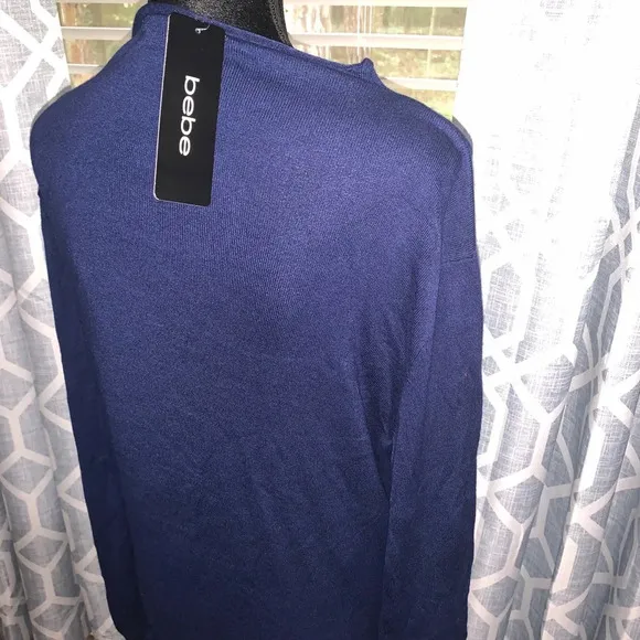 BEBE women’s blue sweater size Medium