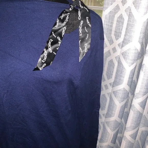 BEBE women’s blue sweater size Medium