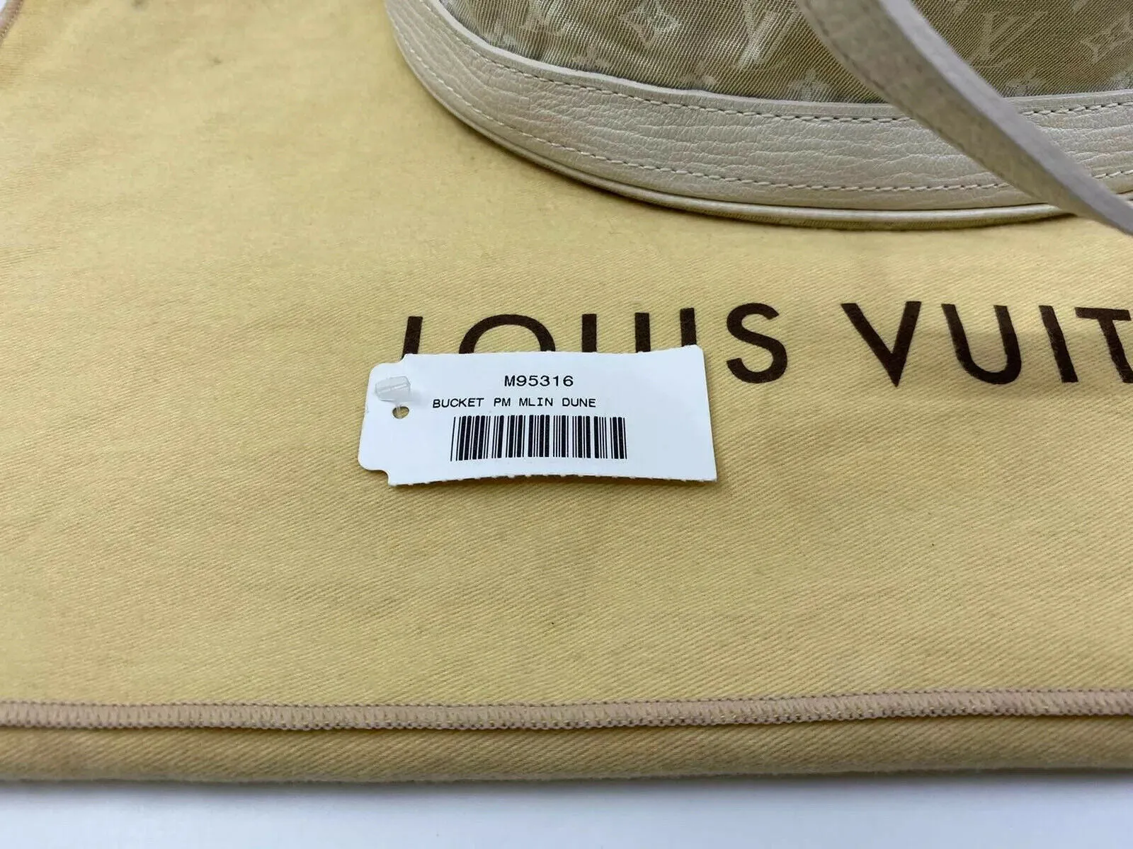 Dune Monogram Mini Lin Bucket PM Bag