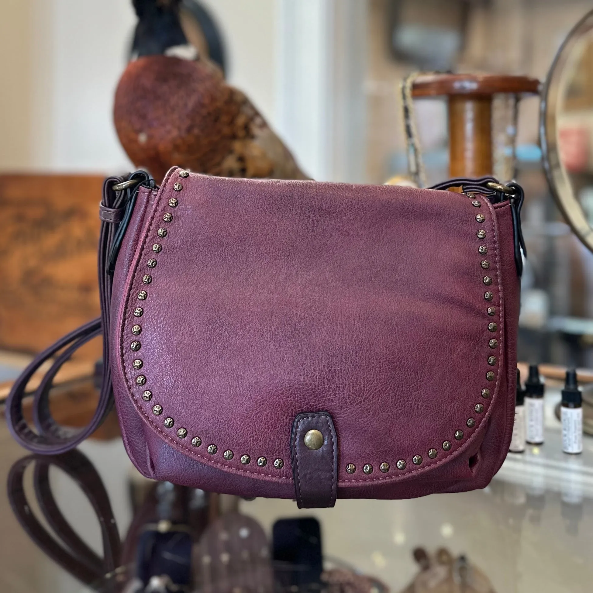 The CHEYENNE Burgundy Studded Front Flap Shoulder Bag