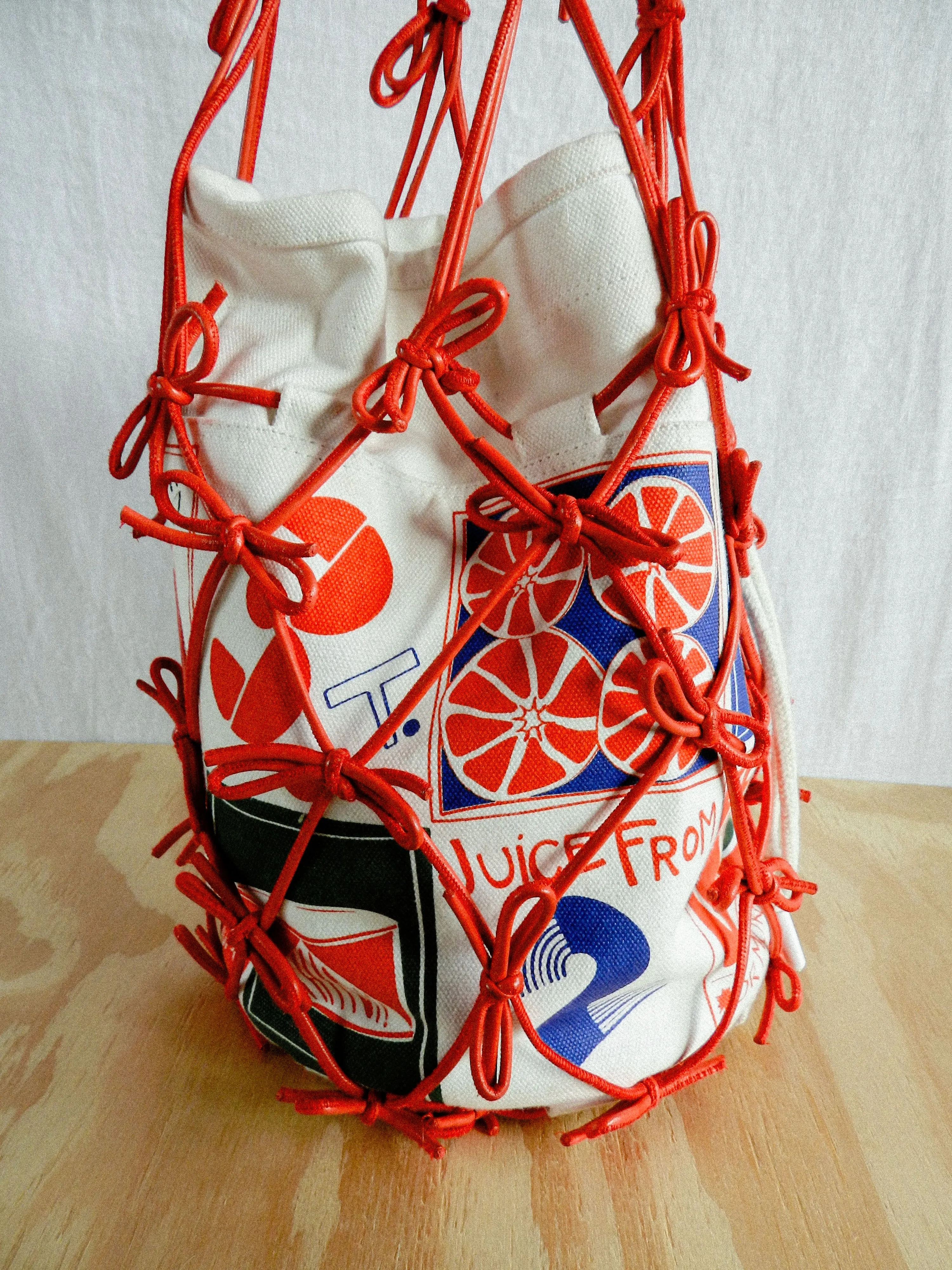 THE HUMMUS BUCKET BAG