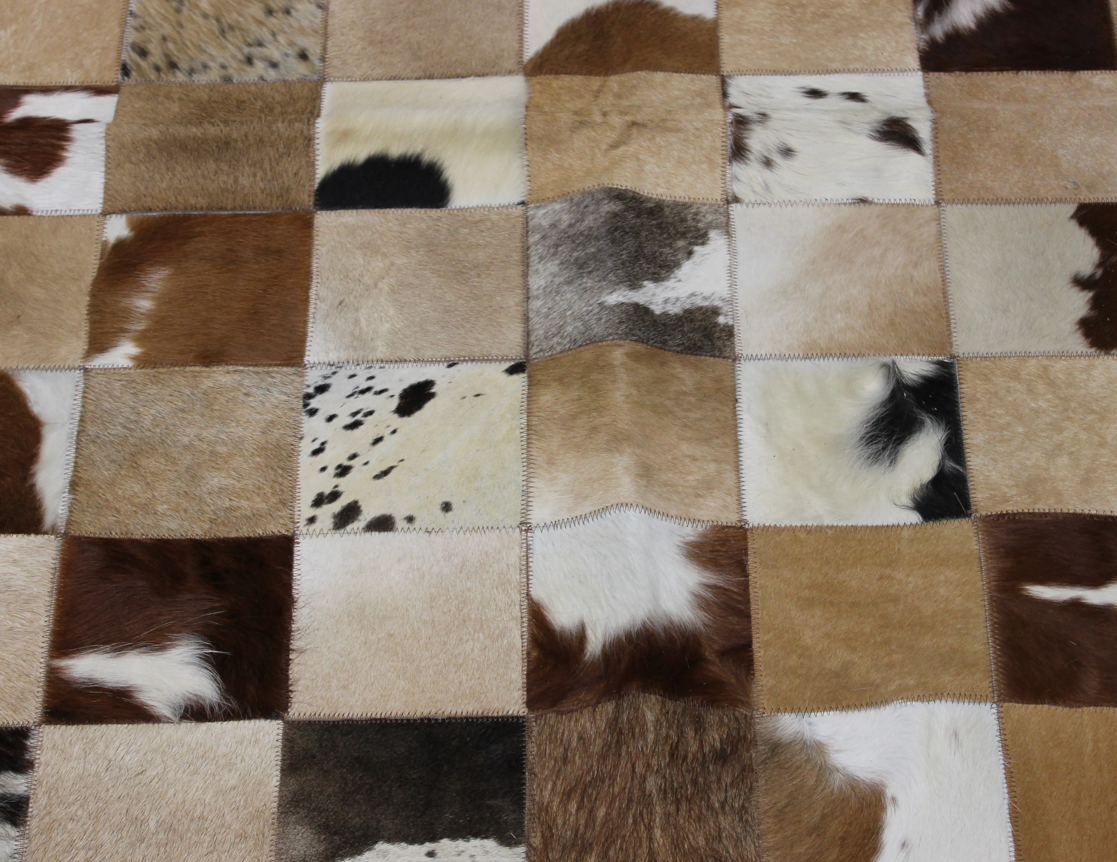 Tricolor Patchwork Cowhide Rug – 7.4ft x 5.5 ft Premium Cowhide Rug