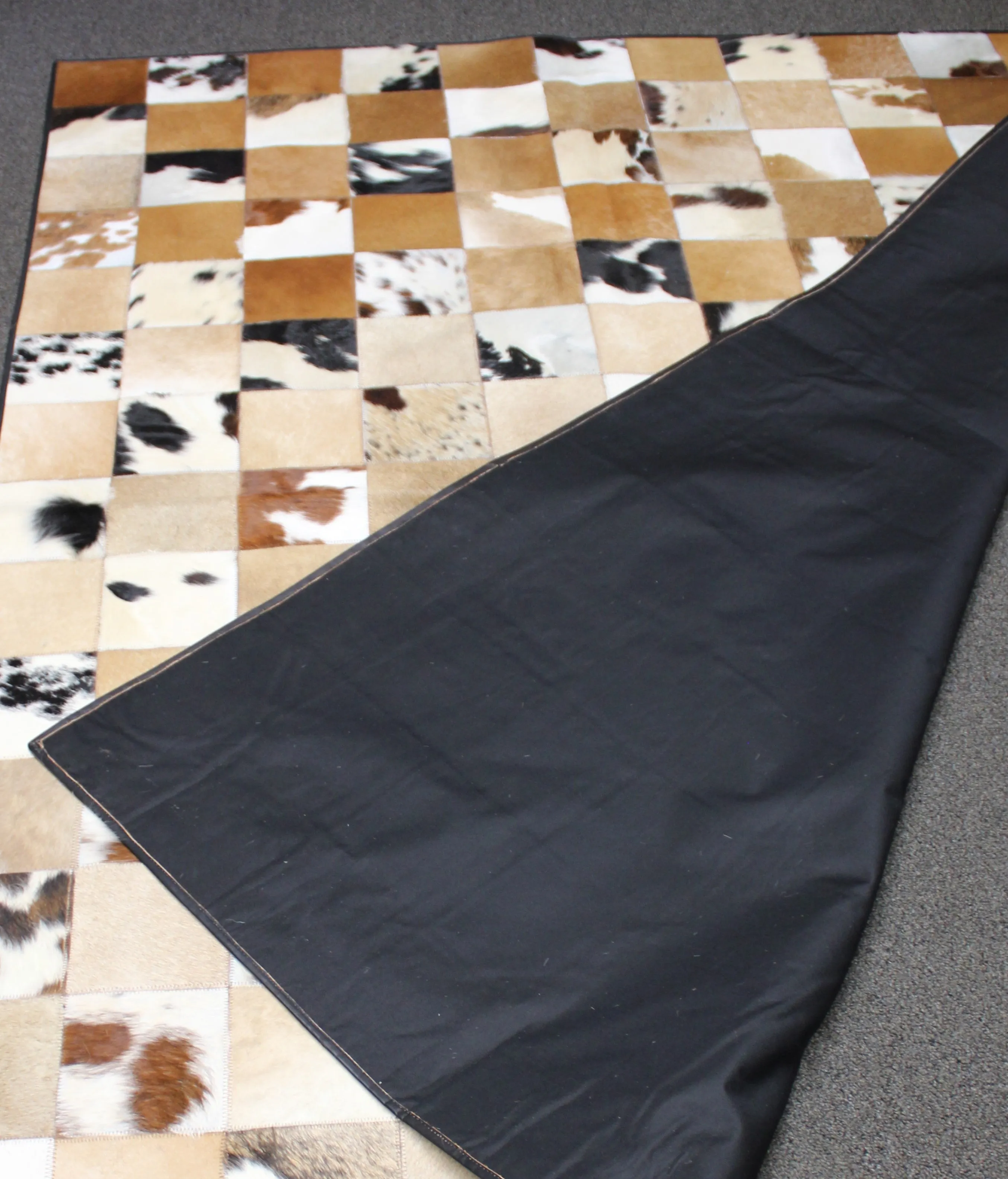 Tricolor Patchwork Cowhide Rug – 7.4ft x 5.5 ft Premium Cowhide Rug
