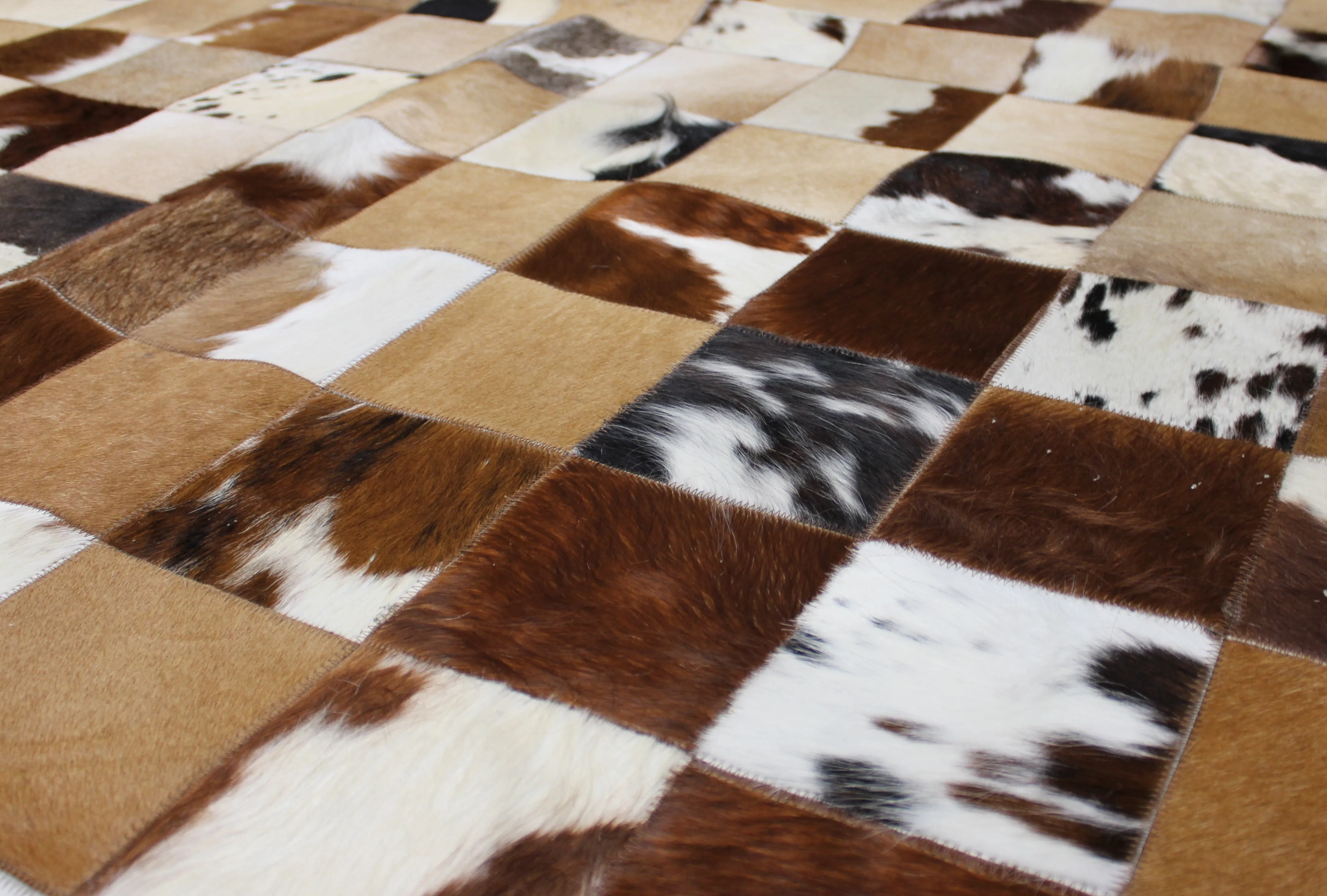 Tricolor Patchwork Cowhide Rug – 7.4ft x 5.5 ft Premium Cowhide Rug
