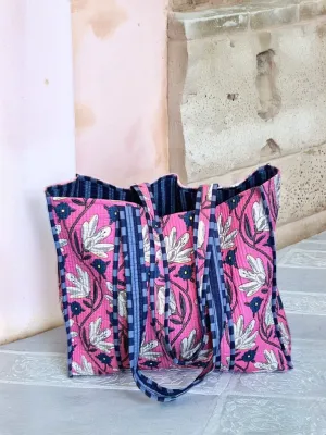White flowers on pink