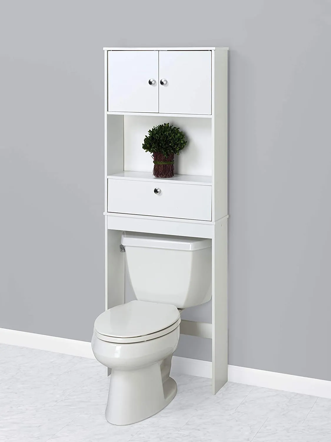 Zenna Home 9401W, Drop Door Bathroom Spacesaver, White! Two cabinet doors with chrome-finished knobs open to reveal a hidden storage shelf.